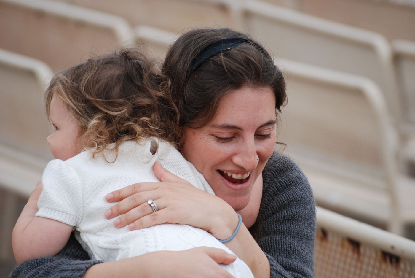Laura Lorber hugging her young daughter